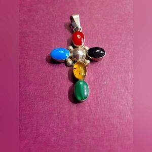 STERLING SILVER PENDANT WITH VARIOUS STONES.